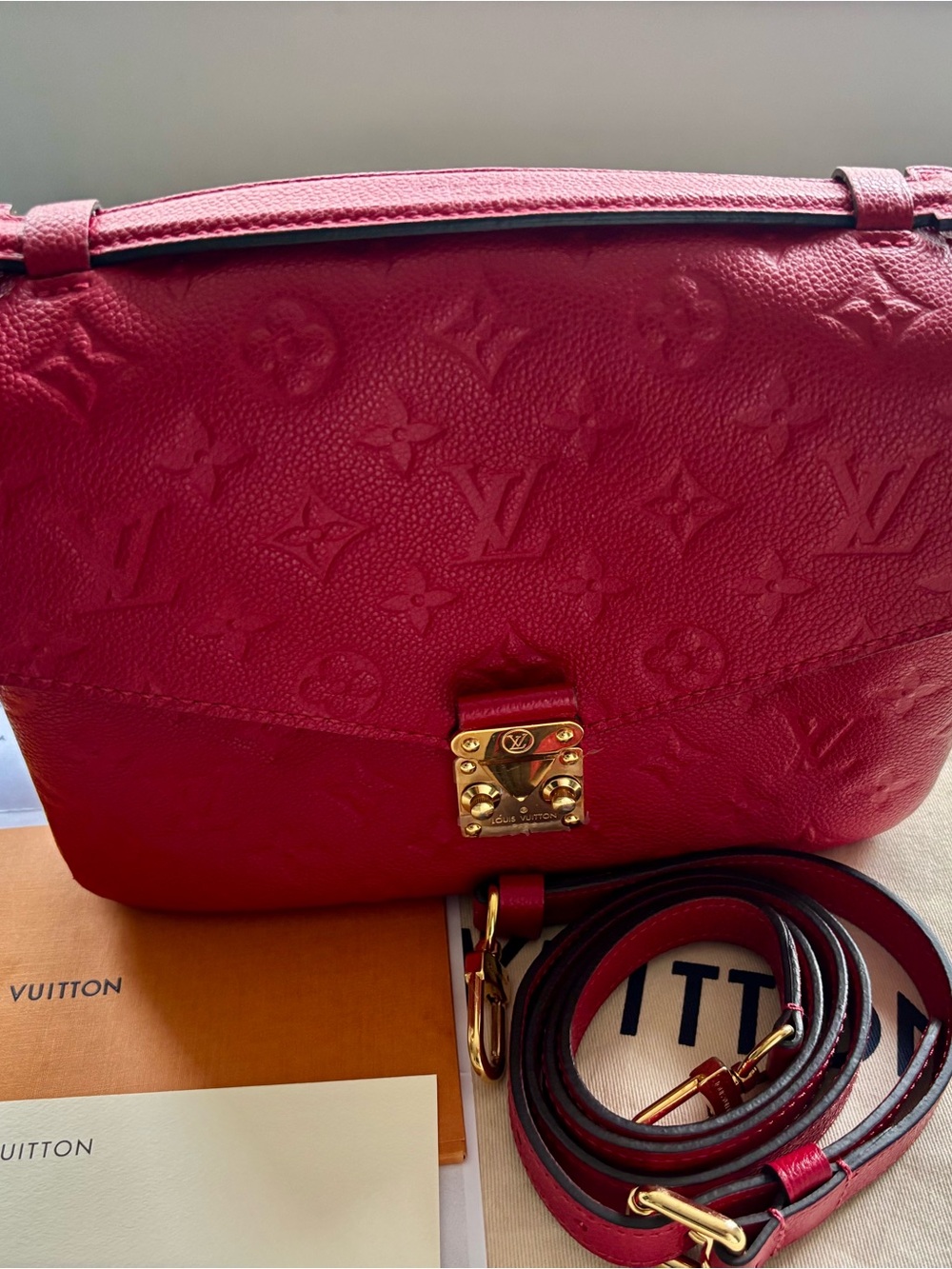Louis Vuitton Metis MM Monogram Empreinte Leather in Scarlet with receipt.